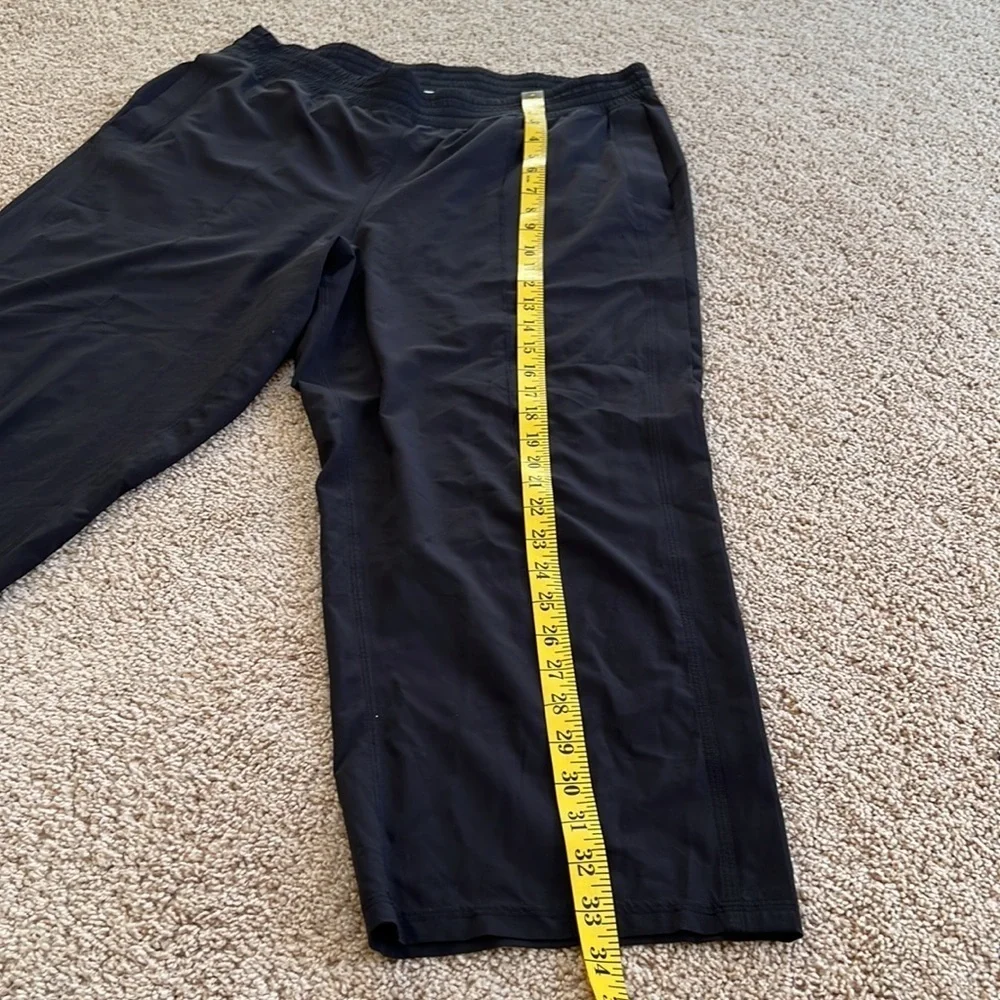 Lululemon Athletica SZ 12, black cropped wide leg pants .